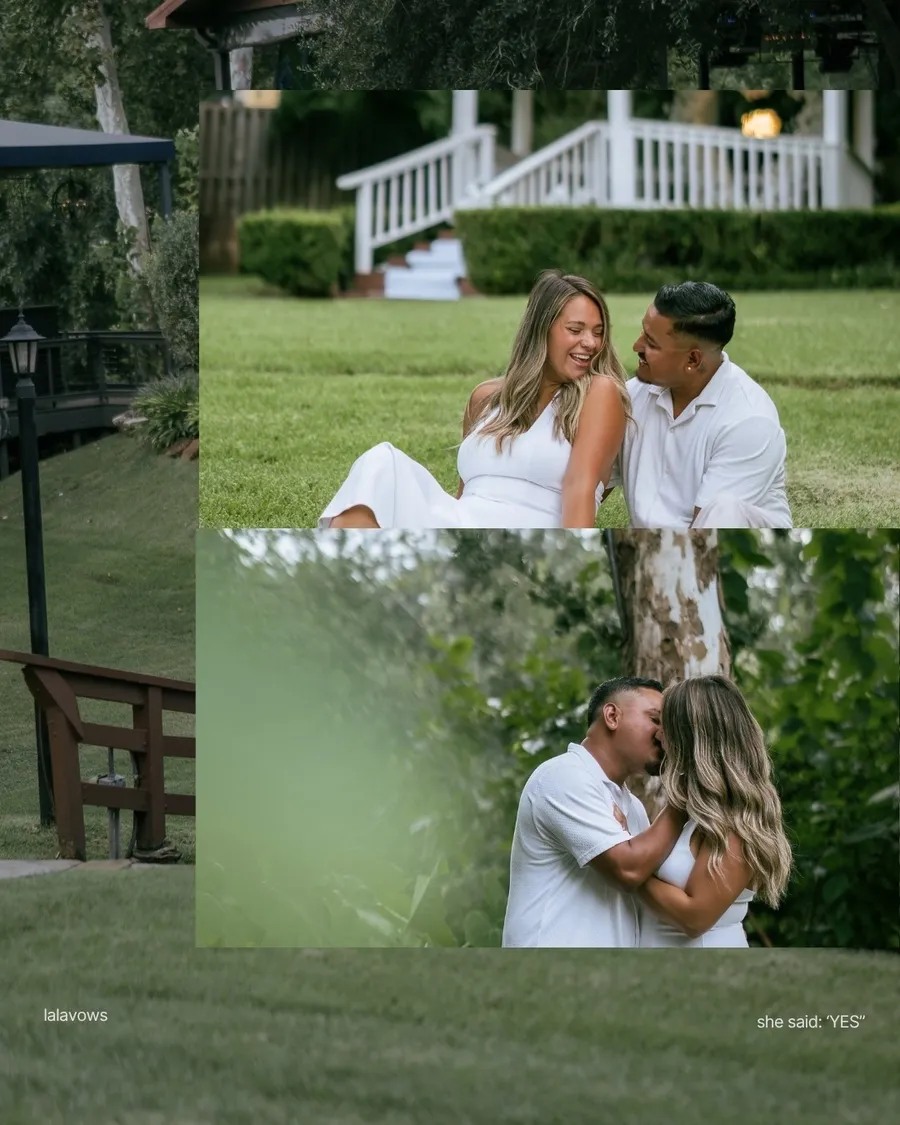 An engaged couple laughing on the grass and kissing under the trees after a garden proposal. Photos by La La Vows.